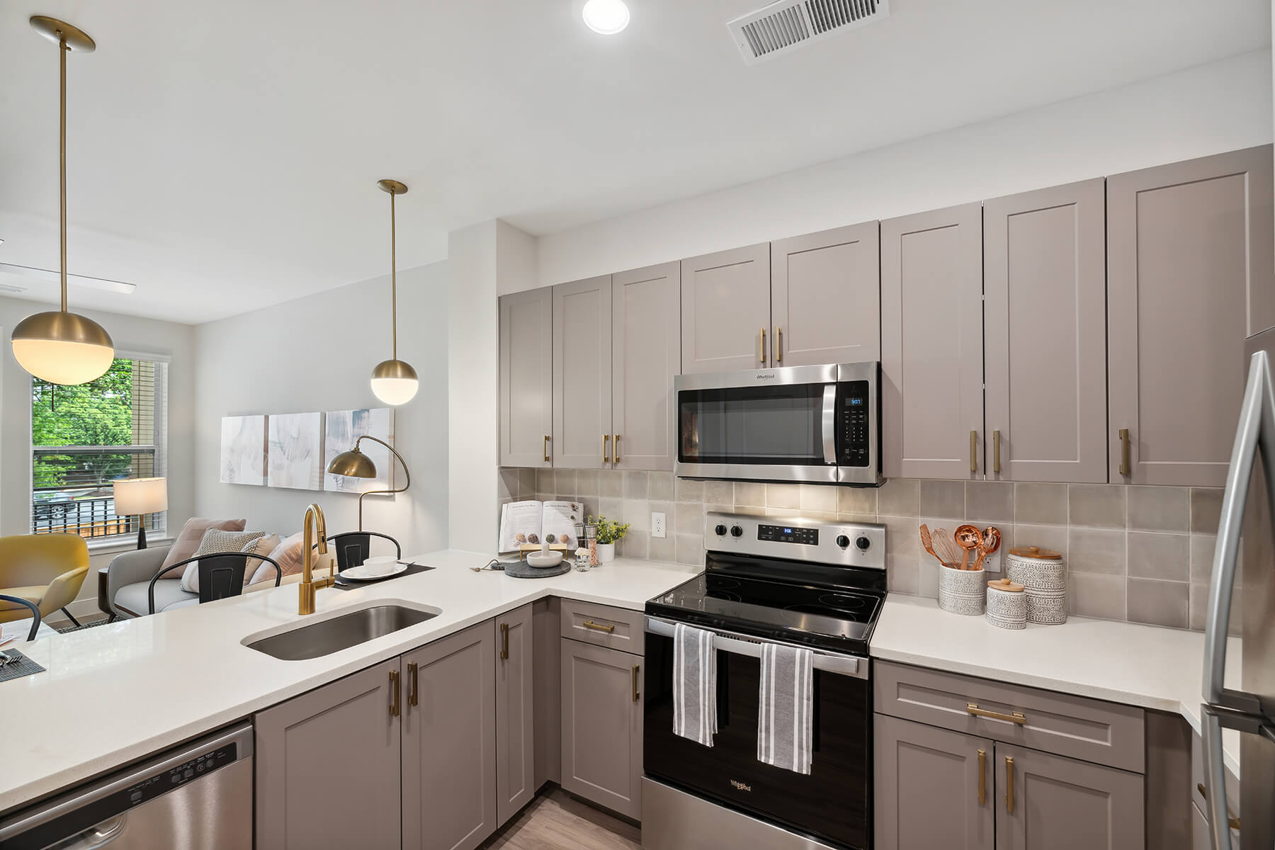 A spacious, modern kitchen at The Moxley in Fairfax, Virginia.