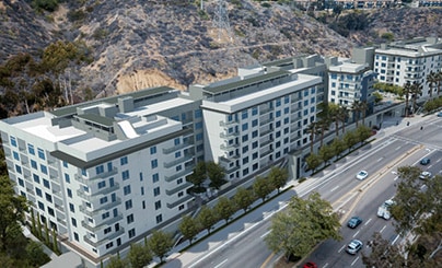 A aerial view digital rendering of the exterior of the Rivair Apartments in San Diego, California.
