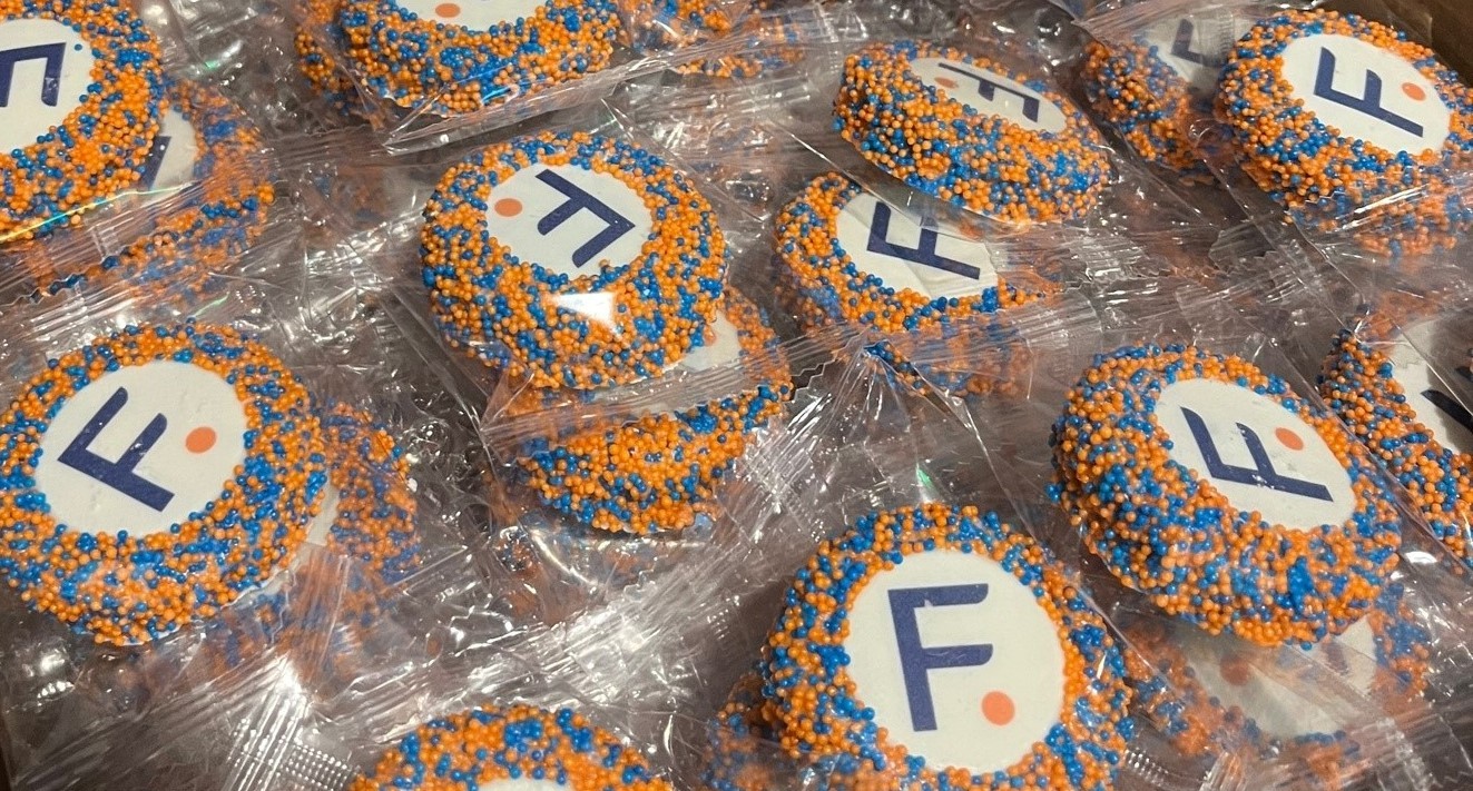 Sugar cookies with blue and orange sprinkles and the Fairfield icon